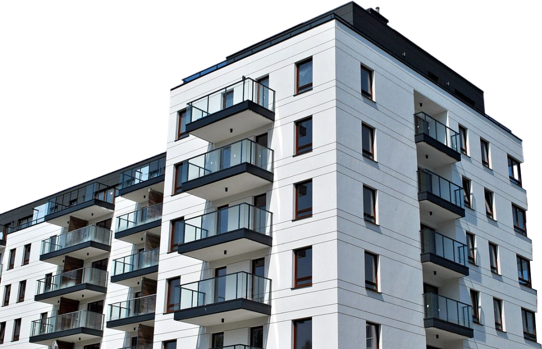 A white building with balconies on the side.