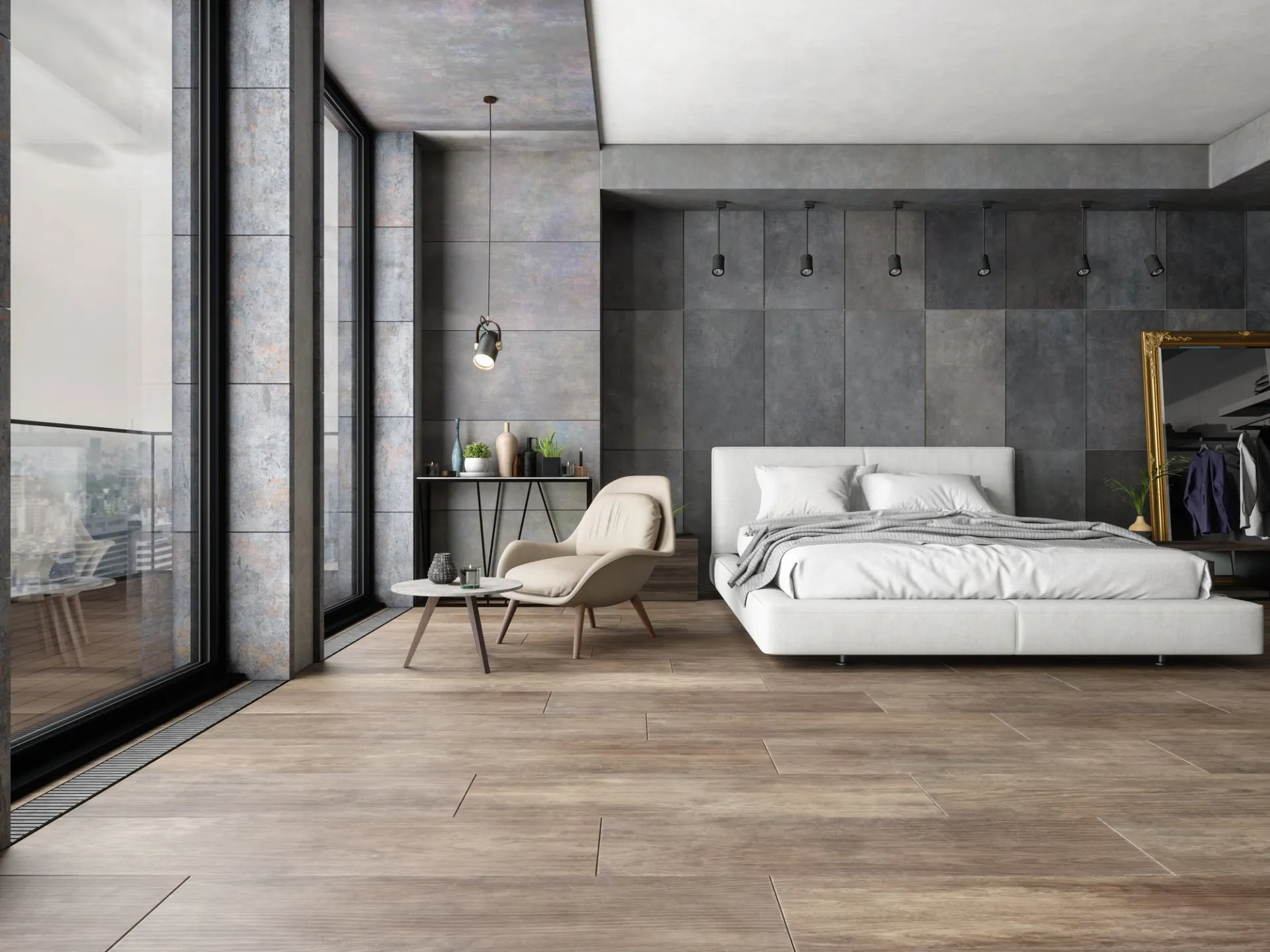 A bedroom with a bed, chair and table.